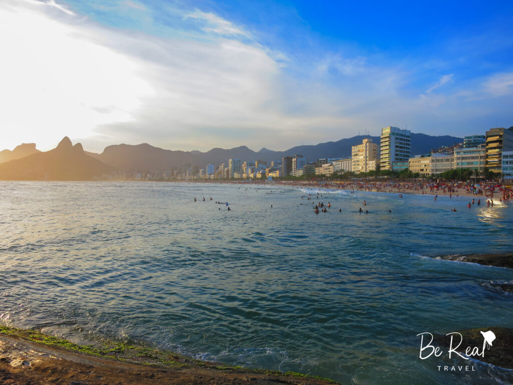 People enjoy the warm beaches in Rio de Janeiro, Brazil