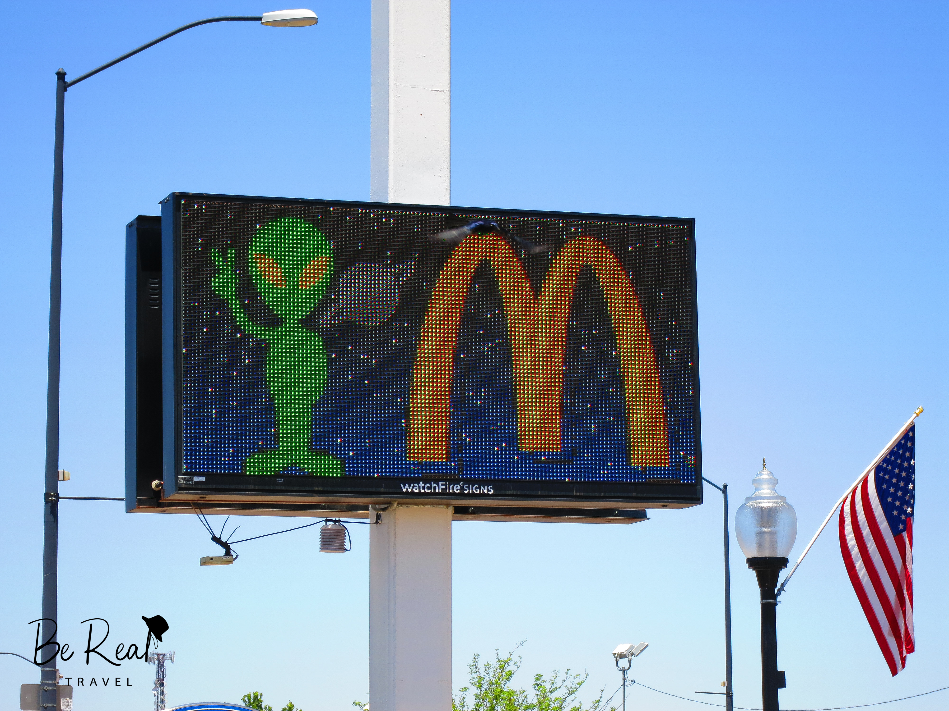 An alien gives the peace sign on a McDonald's billboard in Roswell, New Mexico